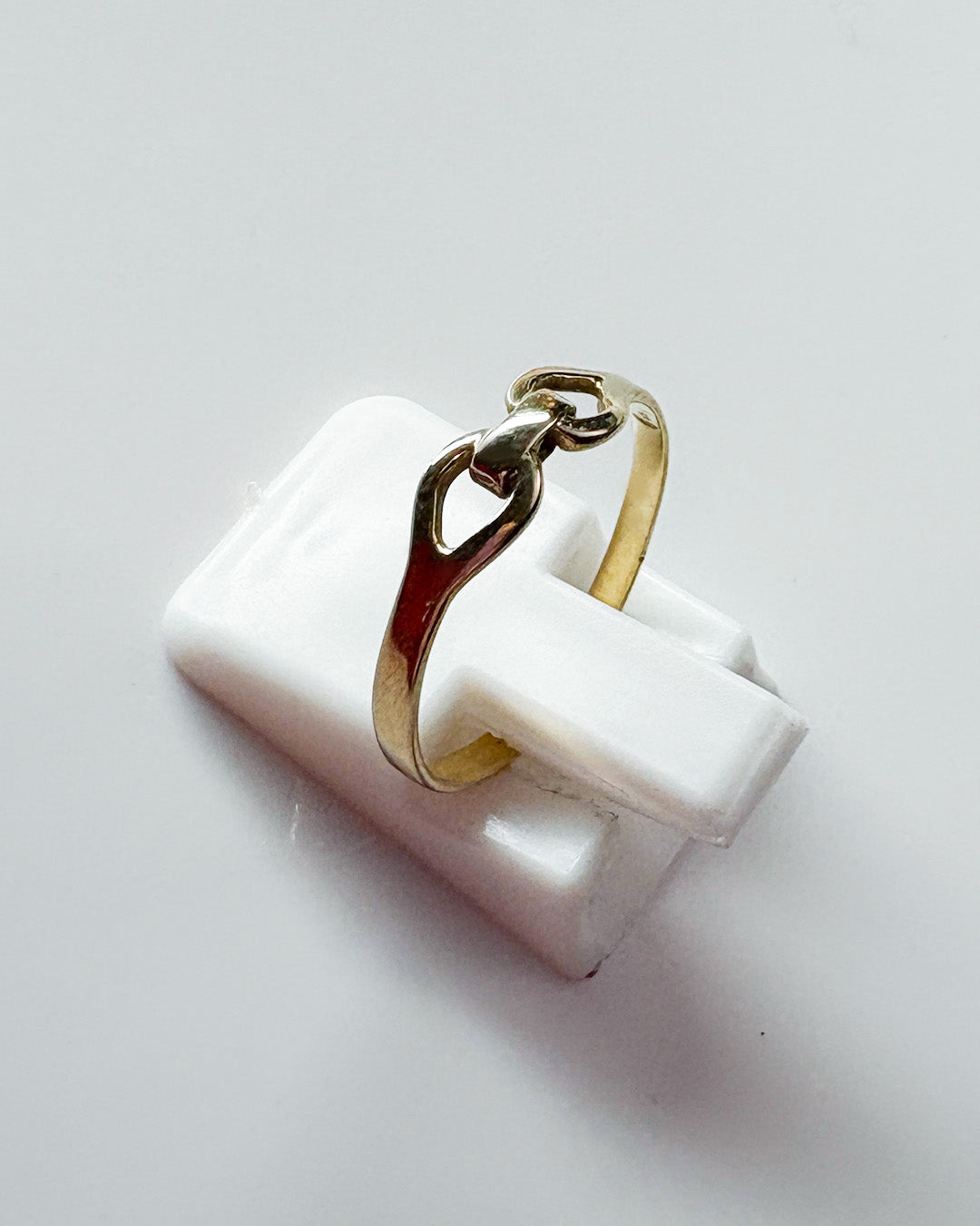 connected gold ring