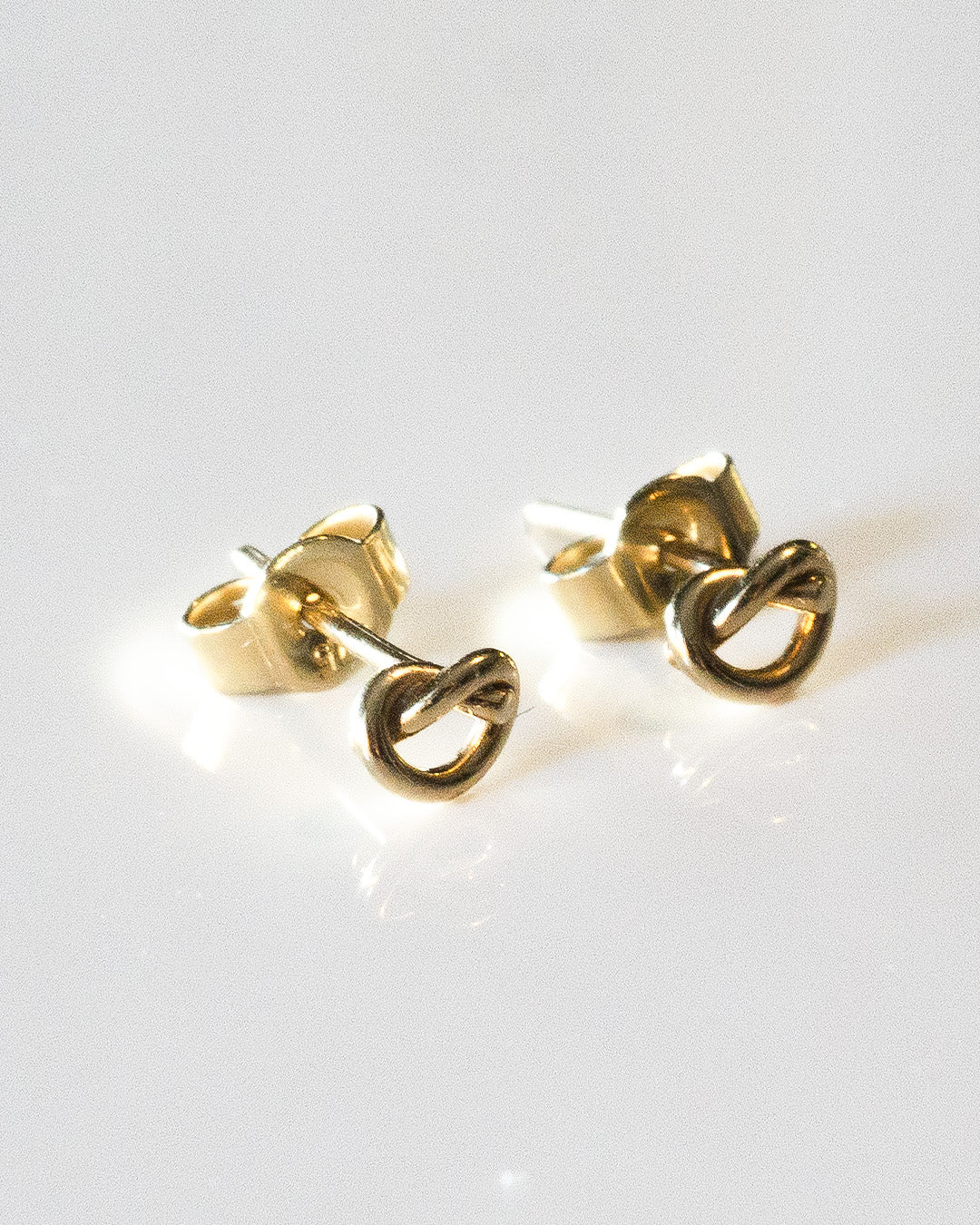 Twist It Like It's Hot Gold Studs