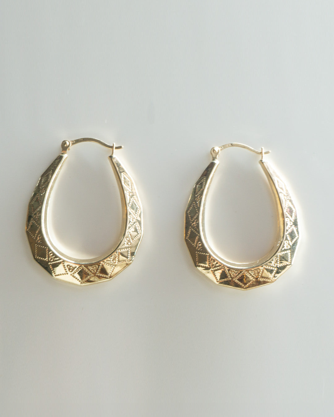 golden pattern hoops