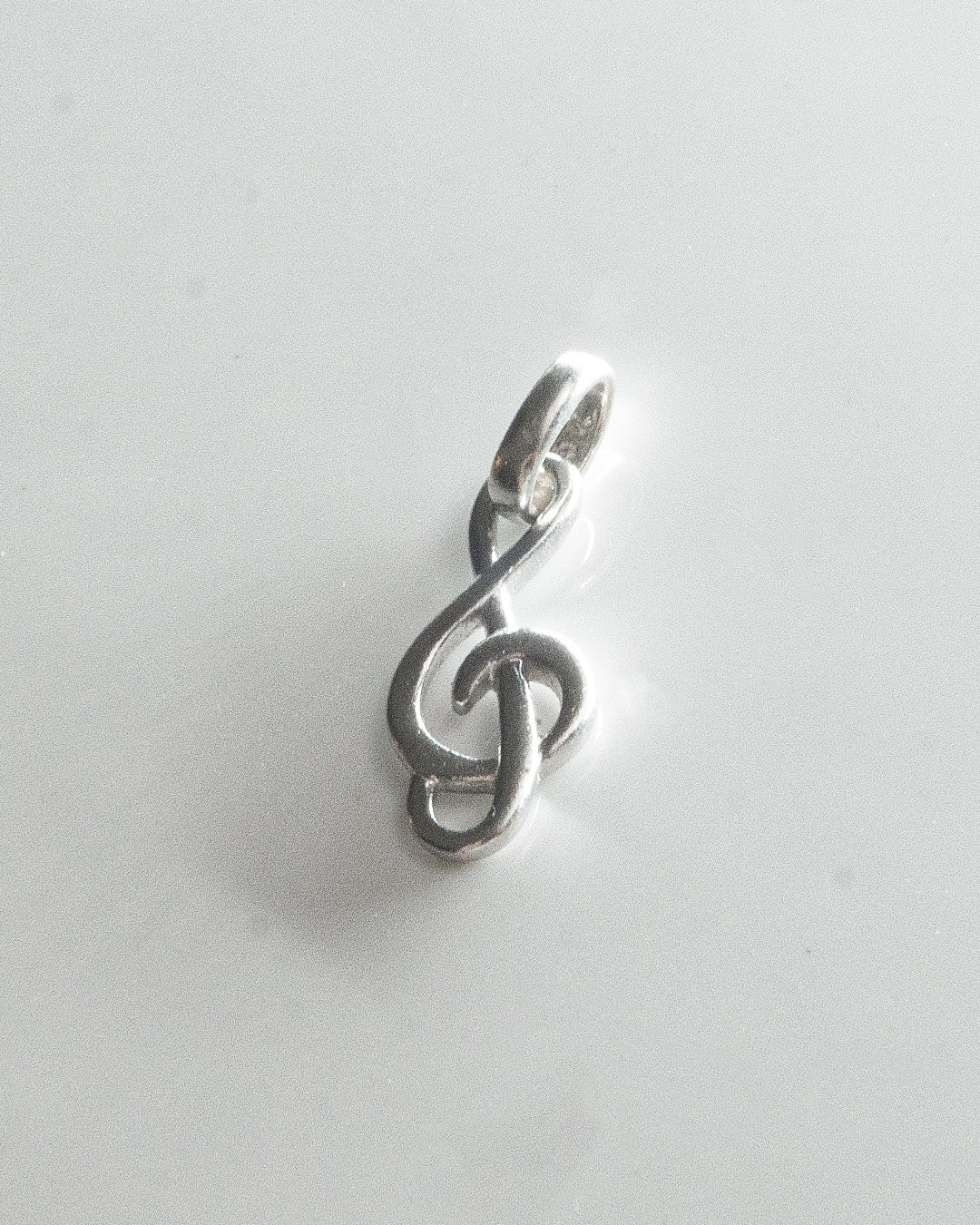 silver symphony charm