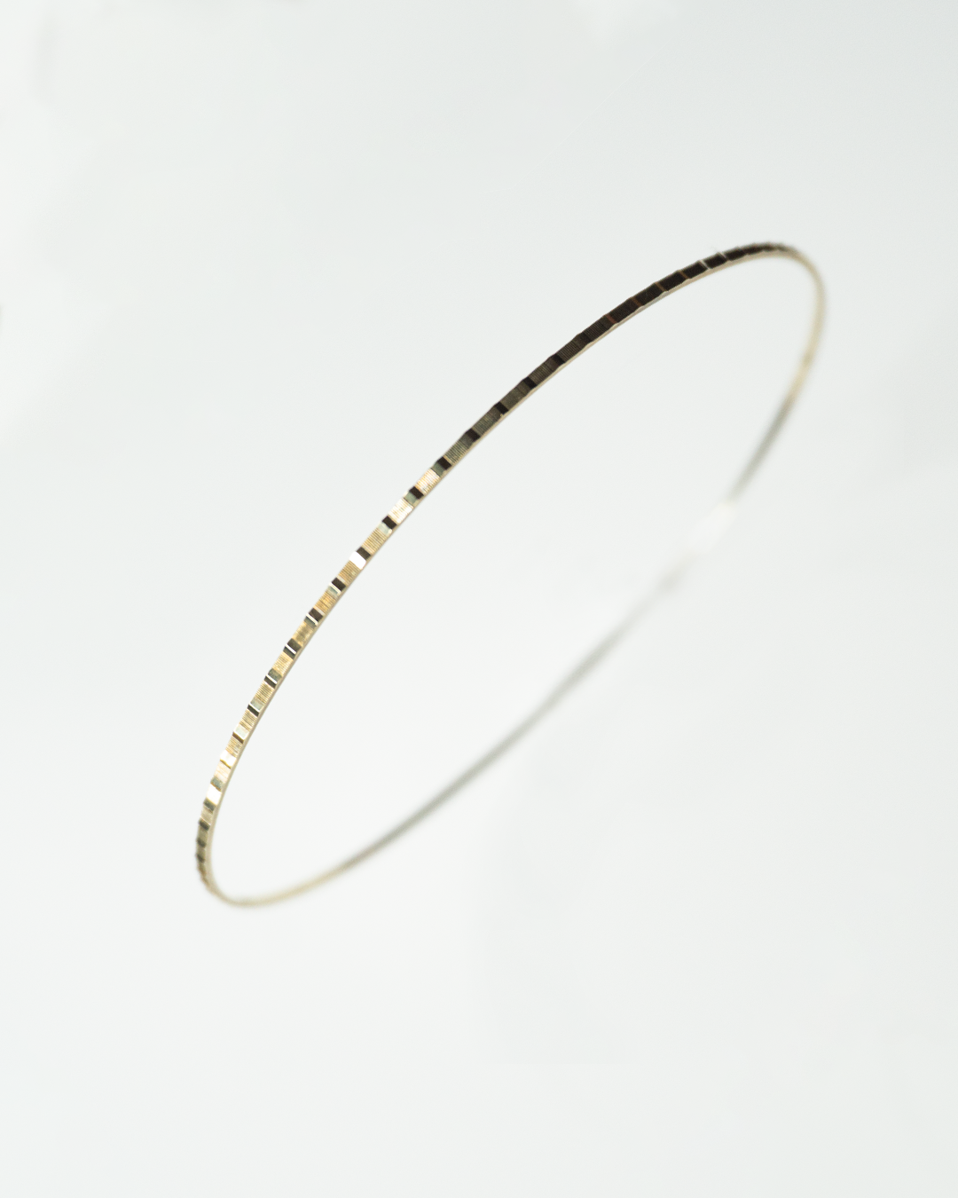 gold linear bangle