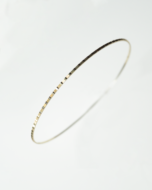 gold linear bangle