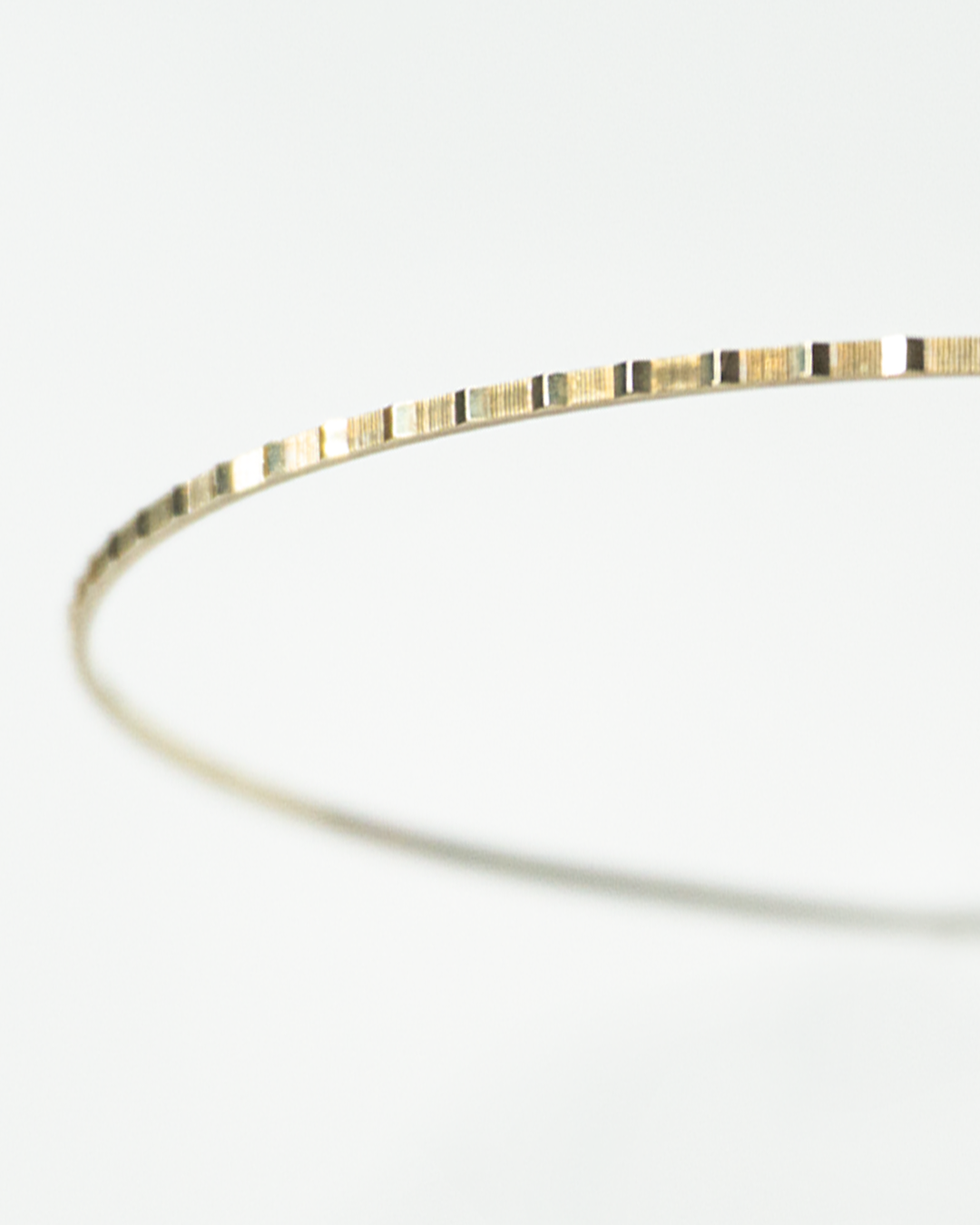 gold linear bangle