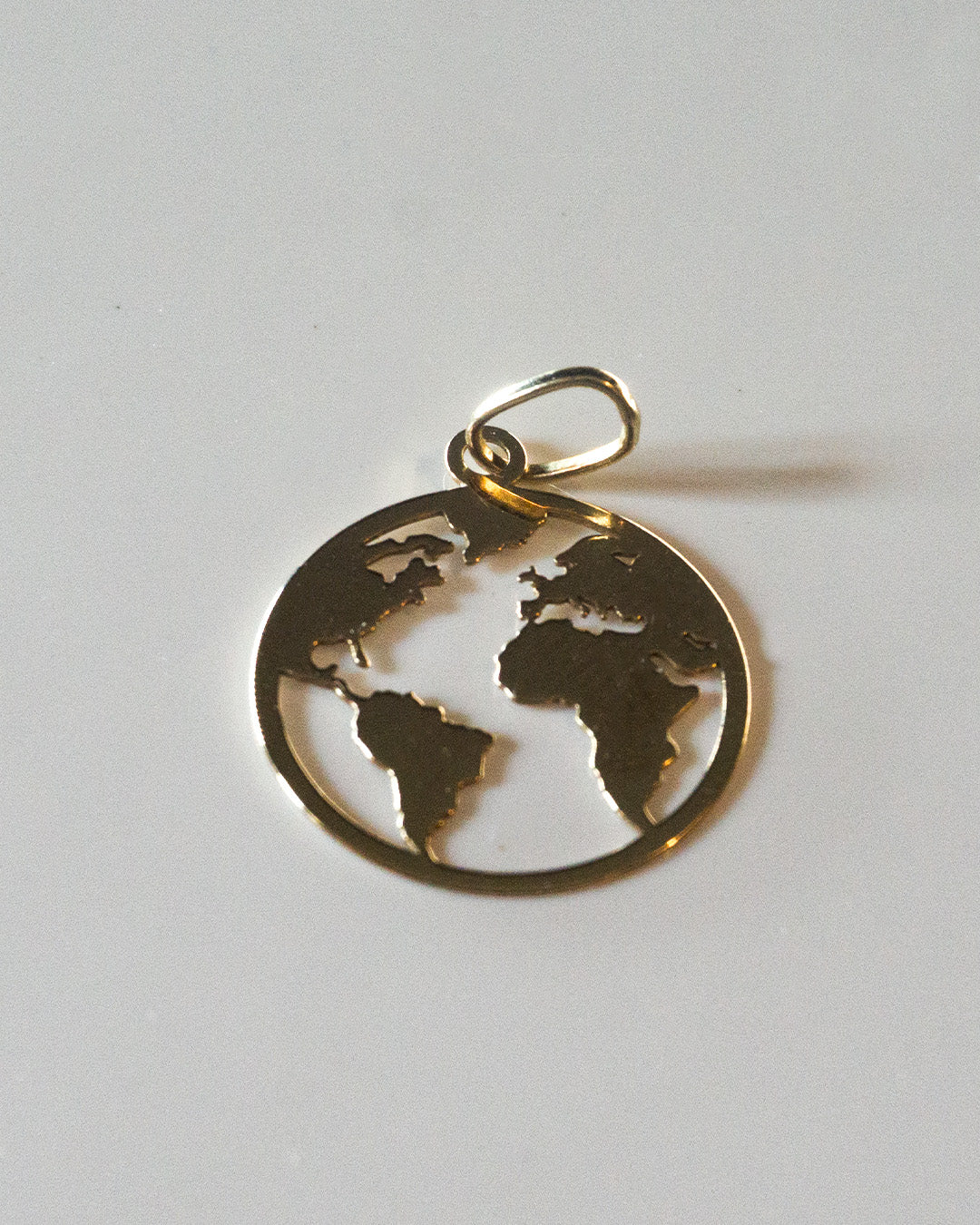 Around the World (Na, Na, Na, Na, Na) Gold Charm