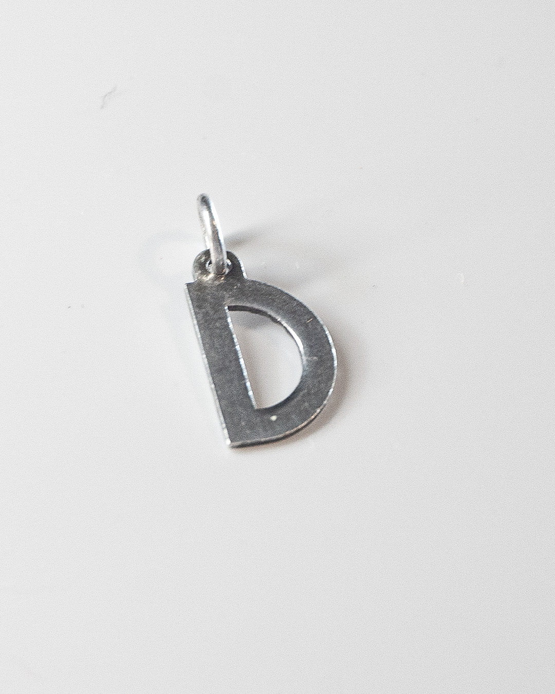 D like Drop it like it's Hot Silver Charm