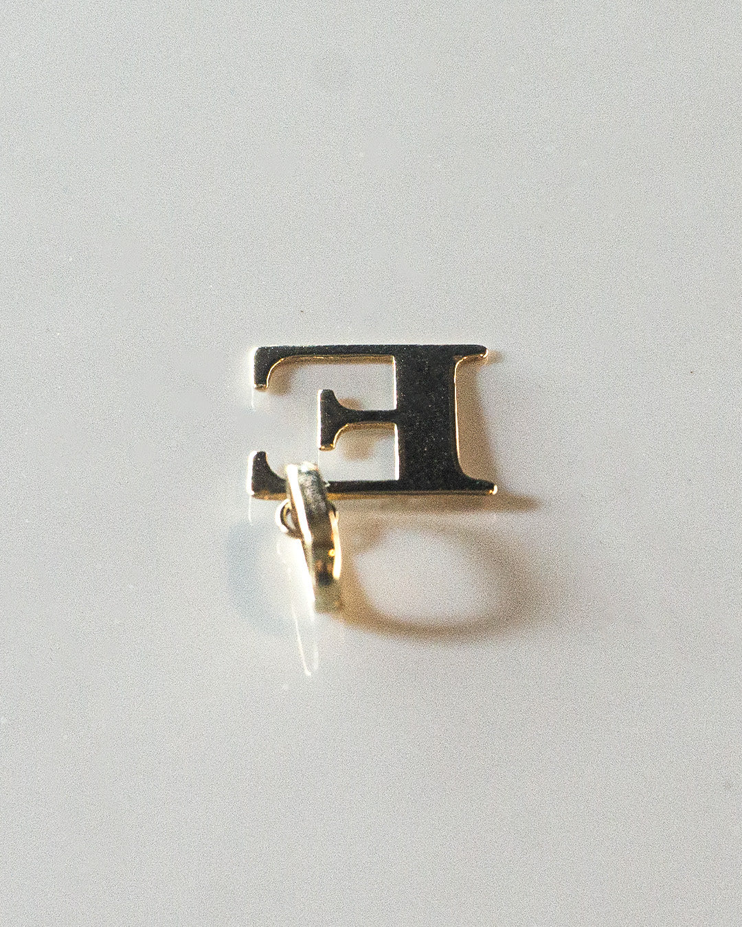 E is for Eternal Flame Gold Charm