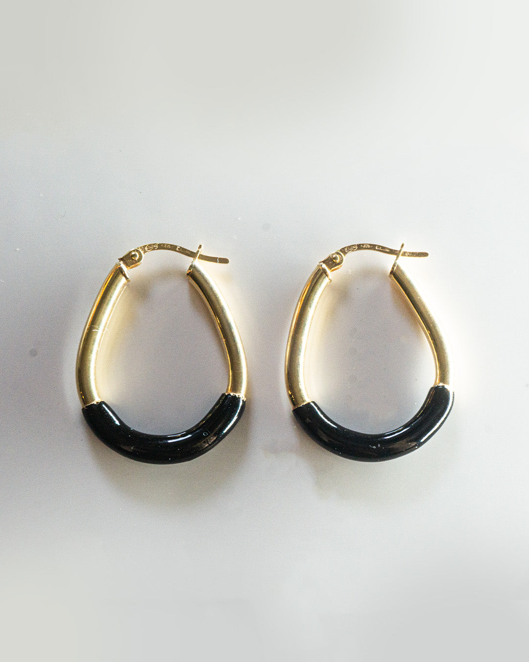 golden black hoops