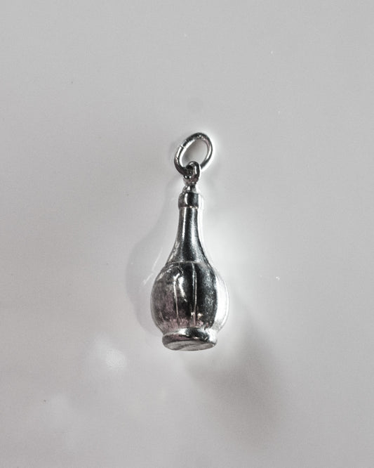 Probably a Wine Bottle Silver Charm