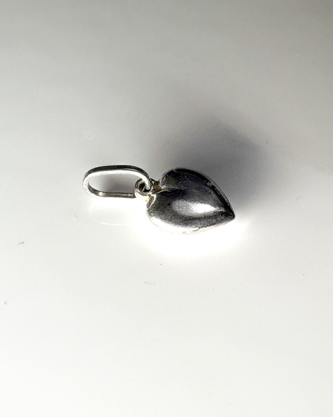 silver shiny heart charm