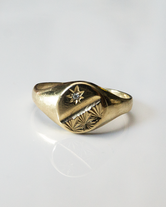 rising star signet ring