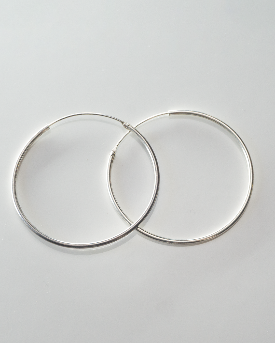 famous silver hoops large