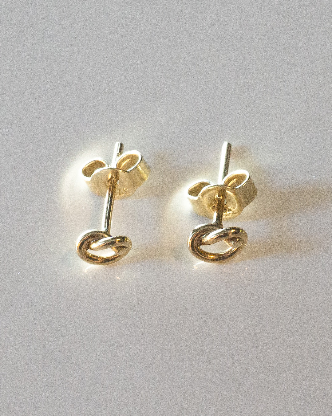Twist It Like It's Hot Gold Studs