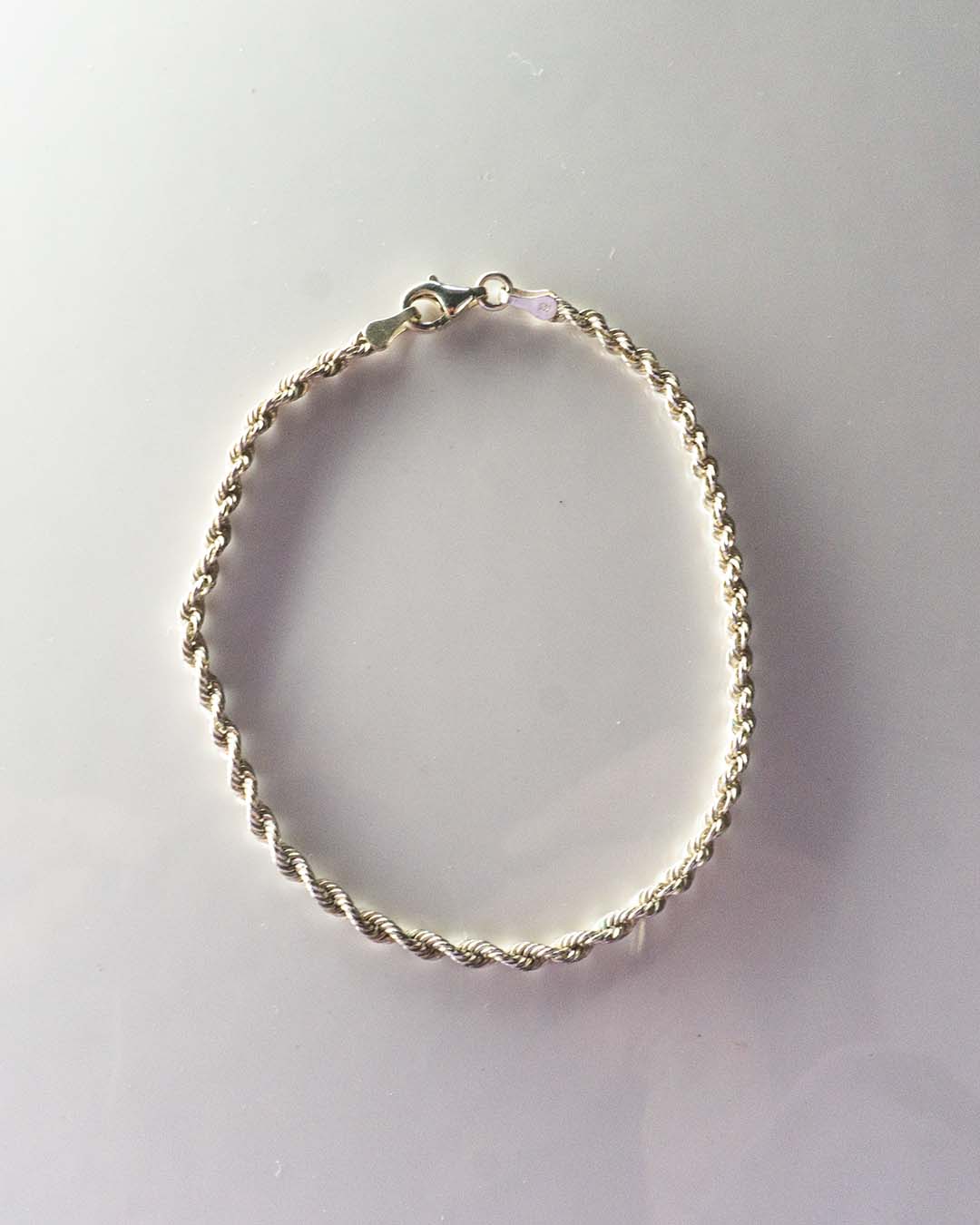 silver ropy bracelet