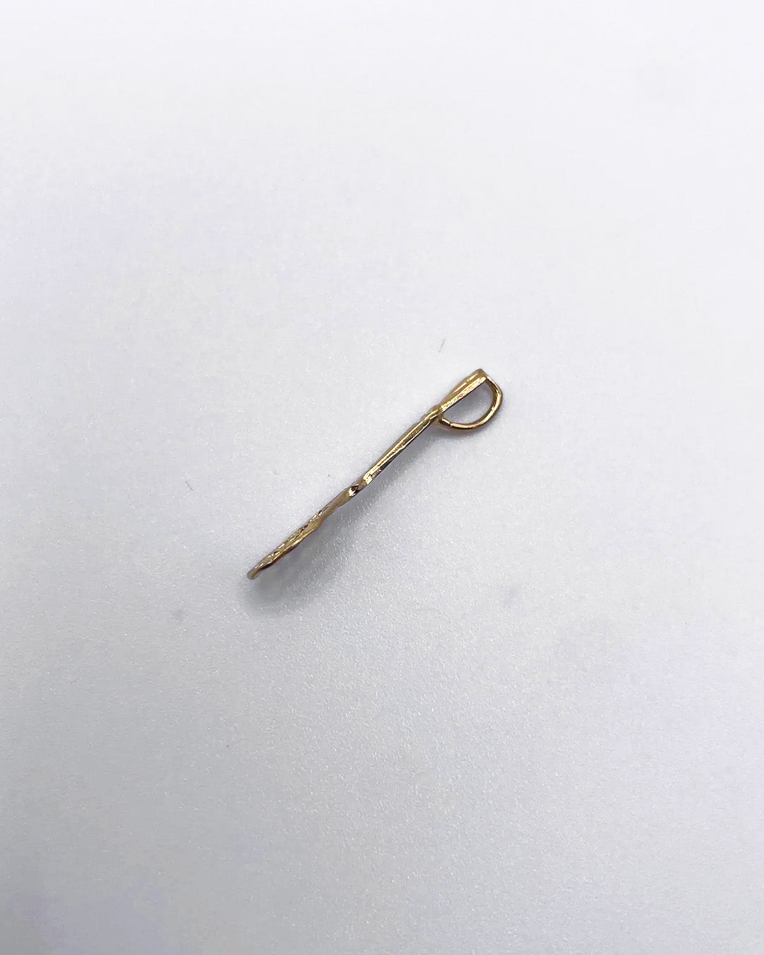 golden racket charm