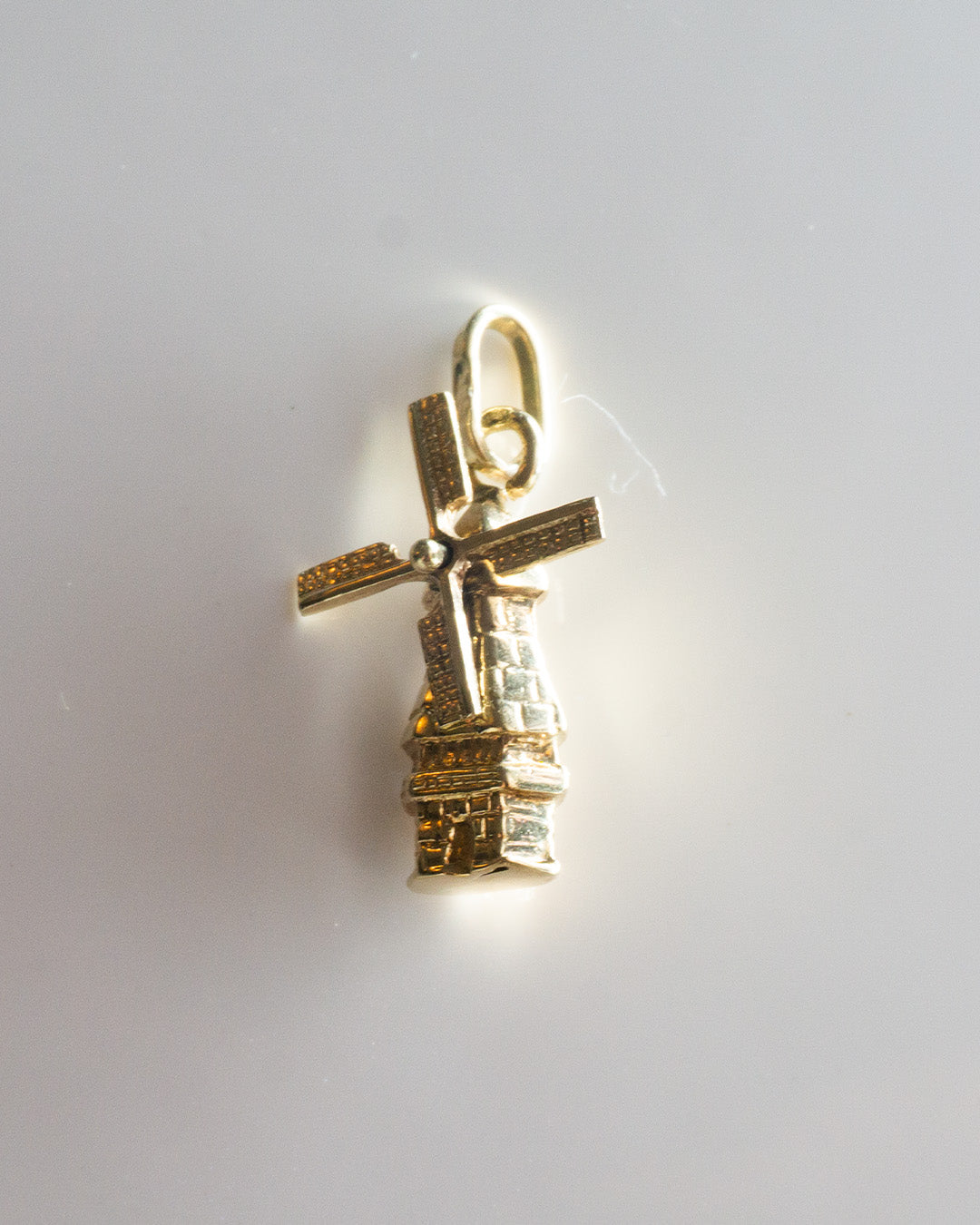 golden mill charm