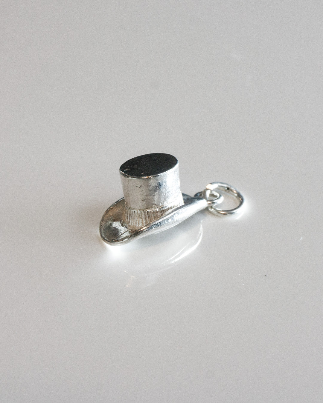 hat attack charm