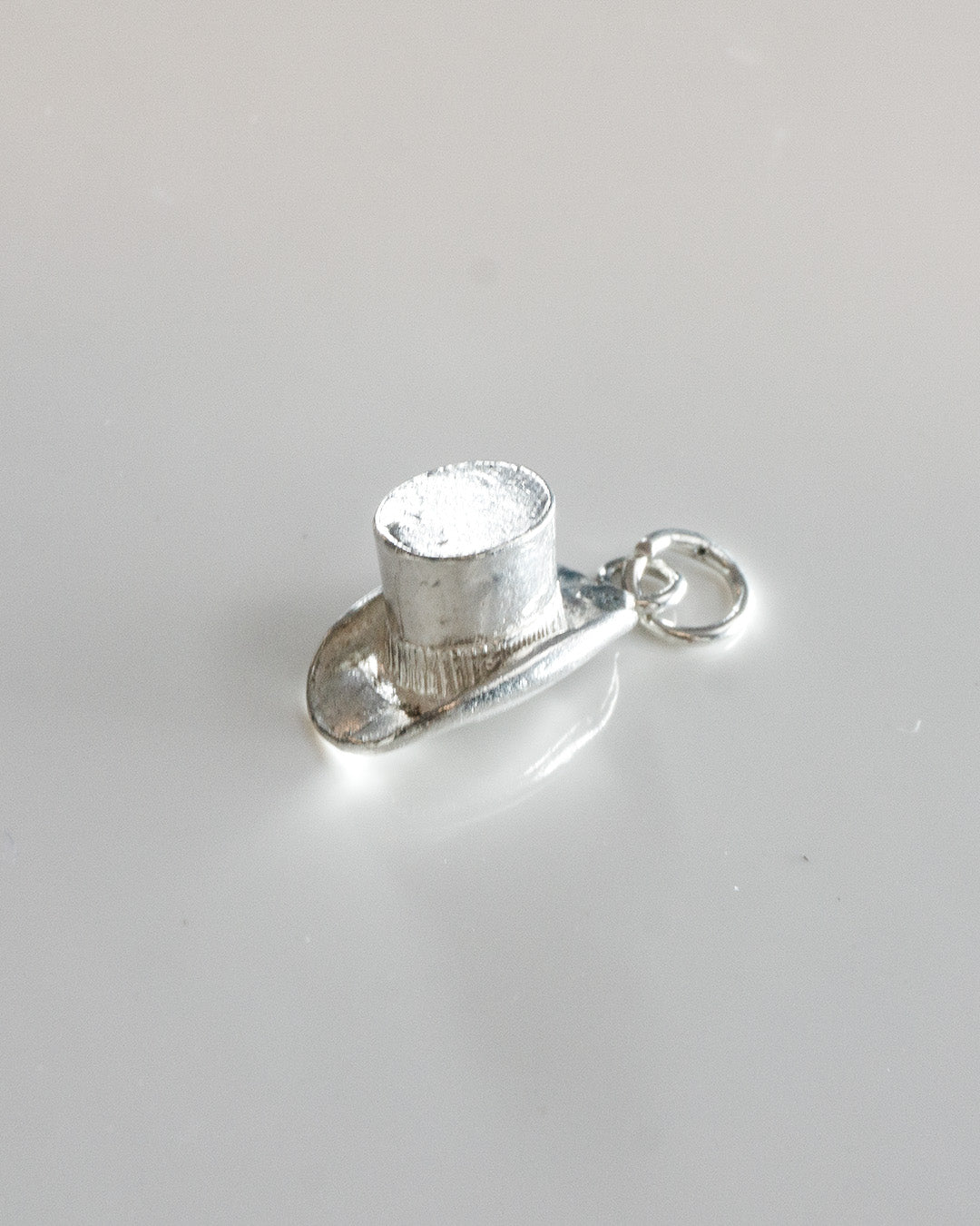 hat attack charm