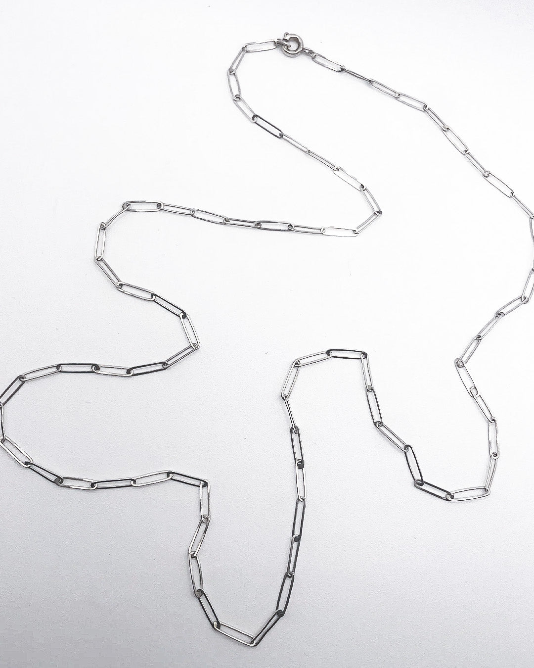 long & very fine bicycle necklace