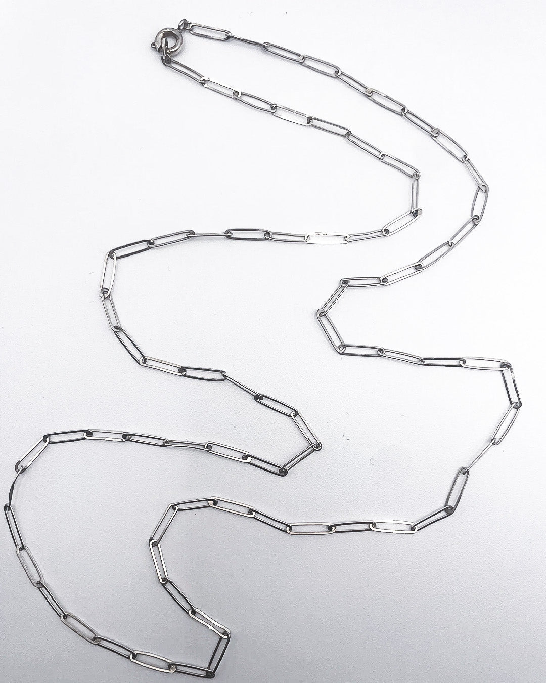 long & very fine bicycle necklace