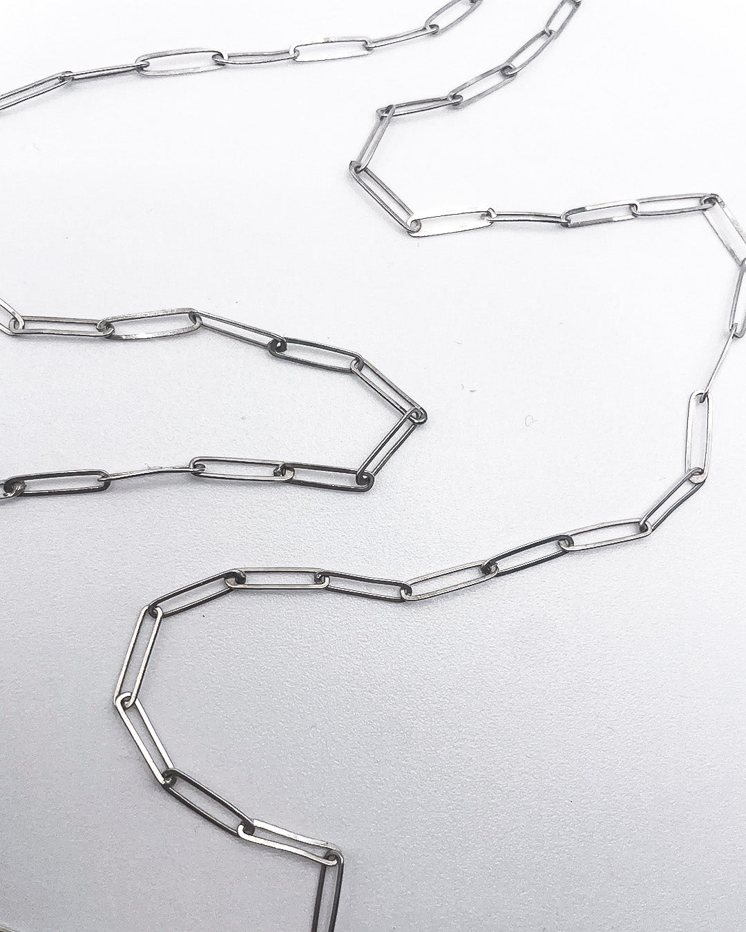 long & very fine bicycle necklace