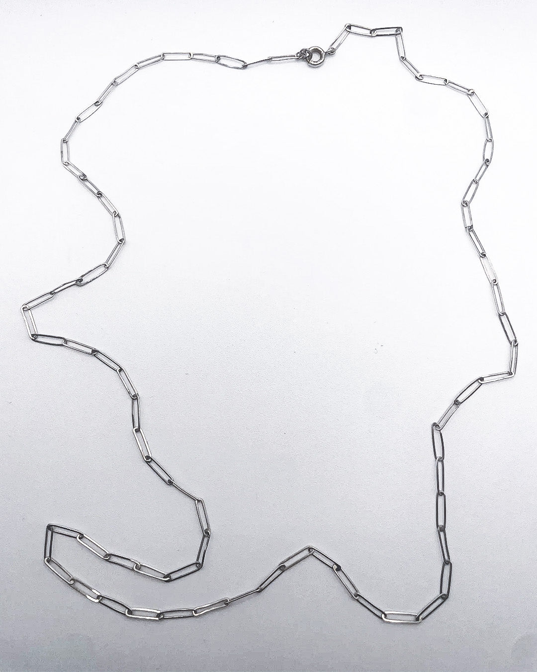 long & very fine bicycle necklace