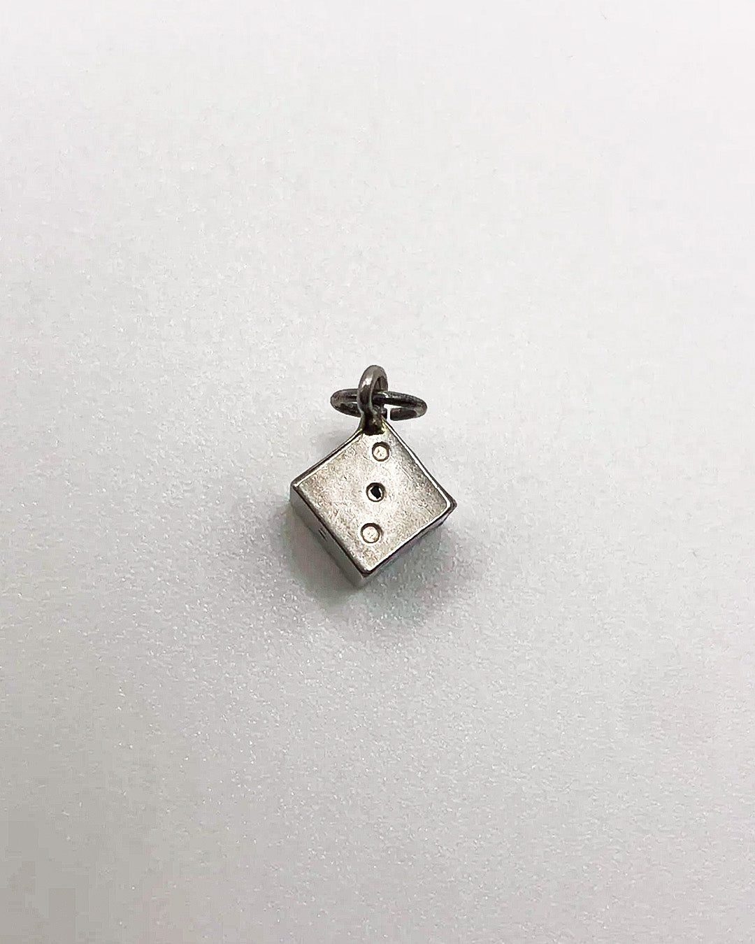 silver dice charm