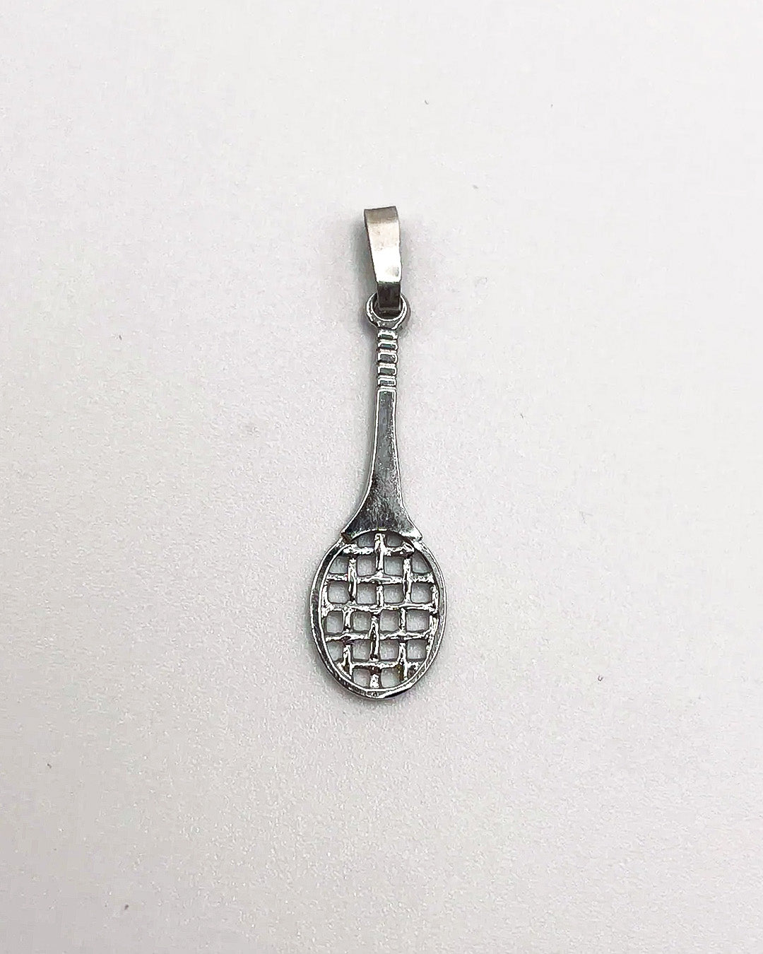 silver racket charm