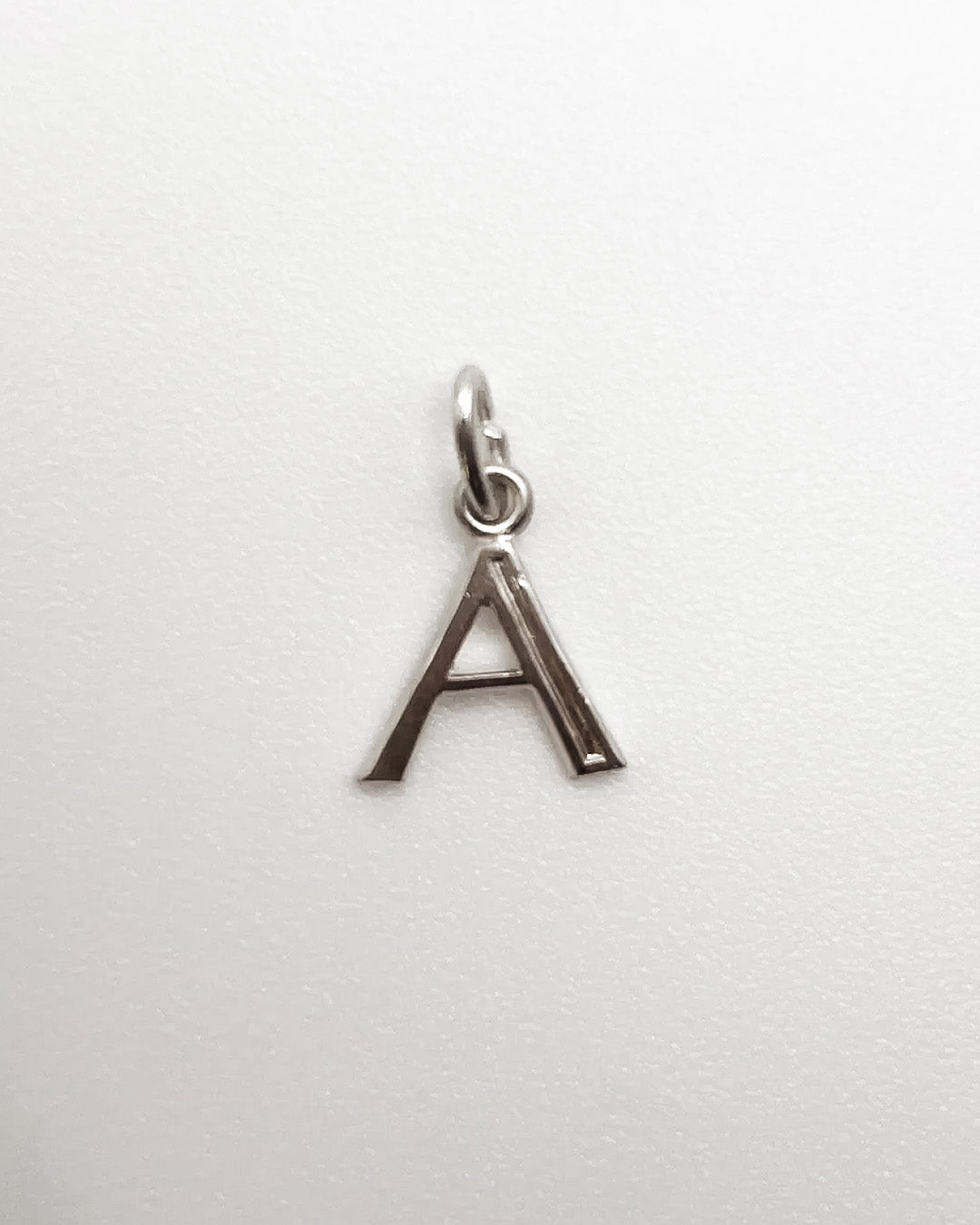 tiny A charm