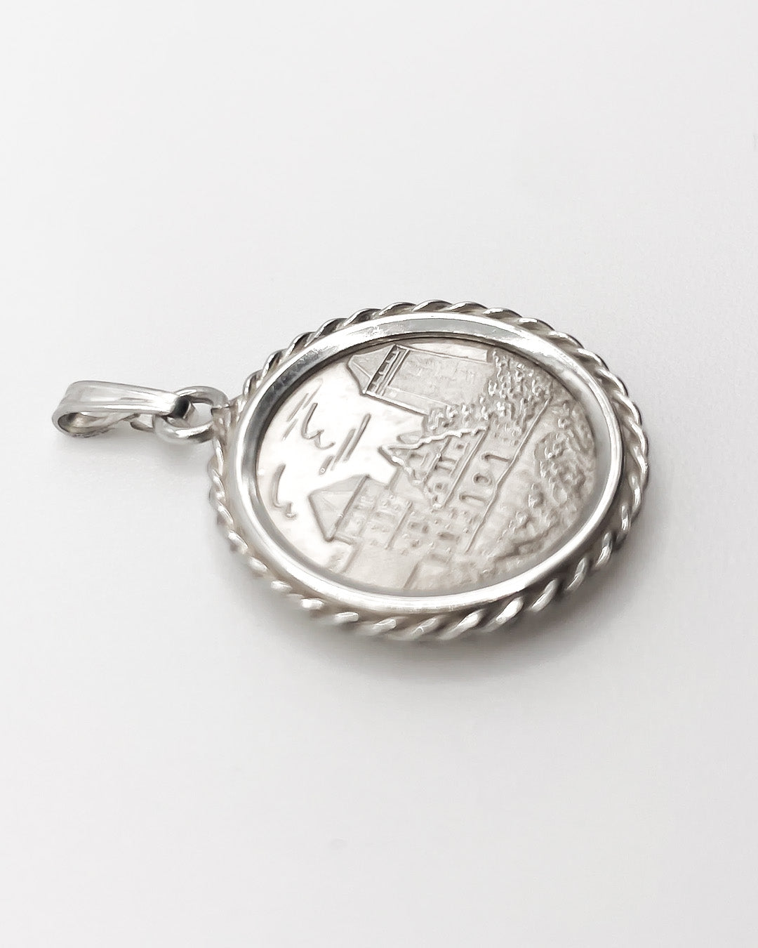 village coin charm