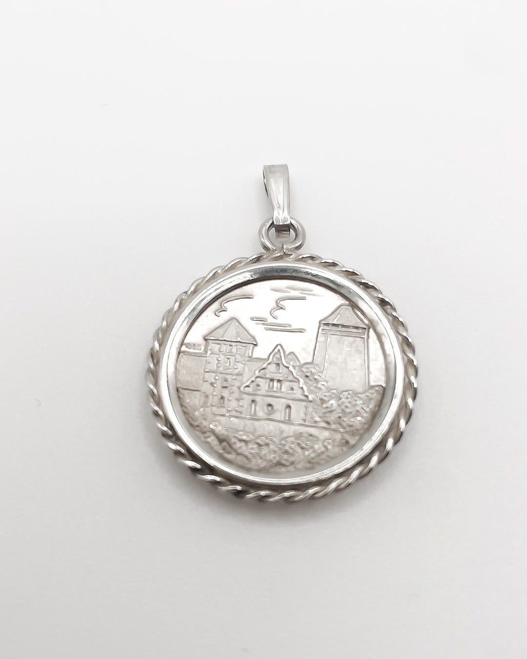 village coin charm