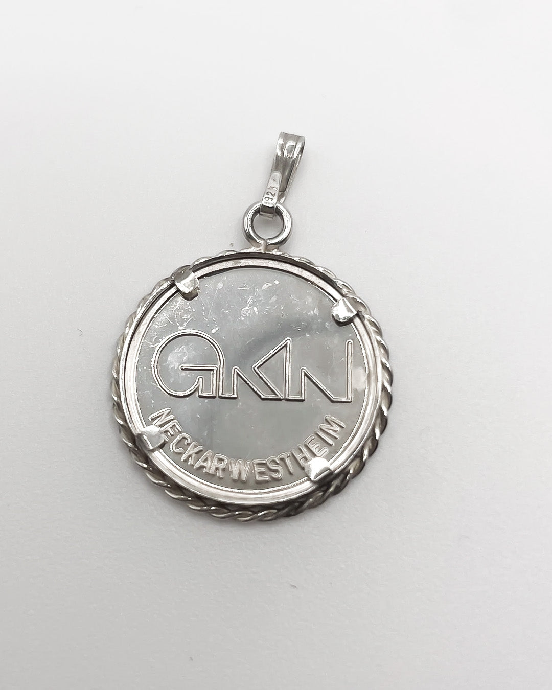 village coin charm
